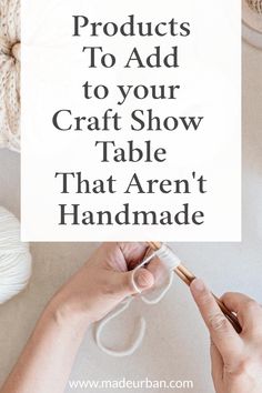 two hands holding a sign that says, products to add to your craft show table that aren't handmade