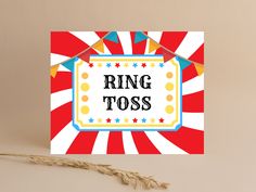 a card with the word ring toss on it in front of a red and white background