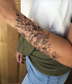 a woman's arm with flowers on it and the words, toutees les publications