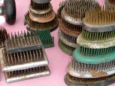 many combs are stacked on top of each other