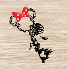 a wooden background with an image of minnie mouse