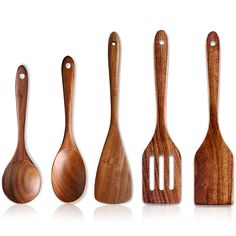 five wooden utensils lined up in a row