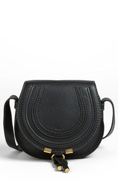 Curvaceous detailing ornaments the saddle-shaped flap of a luscious crossbody crafted from sumptuous grained leather. Style Name:Chloé Small Marcie Crossbody Bag. Style Number: 903258. Chloe Mini Marcie, Classic Crossbody Bag, Best Crossbody Bags, Best Designer Bags, Crossbody Bags For Travel, Black Leather Crossbody Bag, Burberry Handbags, Chloe Marcie, Prada Handbags