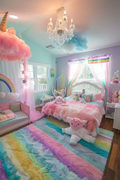 a bedroom decorated in pastel colors with a rainbow rug and chandelier hanging from the ceiling