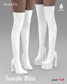 two women's white boots with high heels