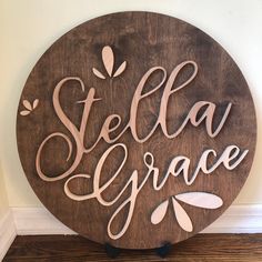 a wooden sign that says stella grace on it