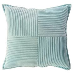 a light blue pillow with pleated lines on the front and back, sitting on a white background