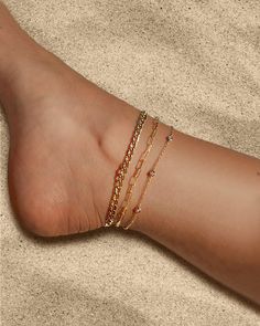 Beautifully handcrafted 14k solid gold anklet with 9 fringe mini bezel shakers diamonds on a dainty cable link chain anklet adjustable 8" - 9". Available in 14k yellow, white and rose gold, uber chic and timeless accessory. Diamond Carat Weight: Approx. 0.15 ctw Total Weight: Approx. 1 gram Standard Production: 4-8 business days Rush Order Production: 2-6 business days Shipping: Select shipping method at checkout. 2-Day Shipping and Overnight shipping available by request at checkout Shipped fro Gold Ankle Bracelets, Diamond By The Yard, Gold Cuban Link Chain, Gold Anklet, Gold Box, Chain Anklet, Cuban Link Chain, Timeless Accessories, Cuban Link