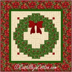 a quilted christmas wreath with red bows and holly leaves on the bottom, in green and white