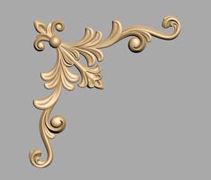 an ornate gold frame on a gray background