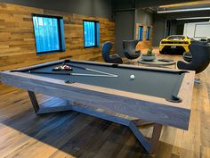 a pool table in the middle of a room