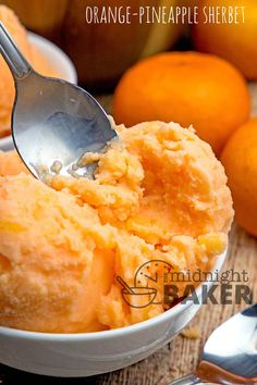 orange - pineapple sherbet ice cream in a bowl with spoon