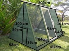 the size of a chicken coop in front of some trees and grass with measurements for each section