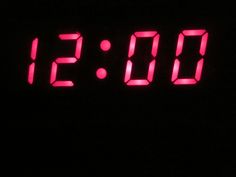 a digital clock displaying the time in the dark