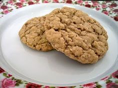 two cookies sitting on top of a white plate