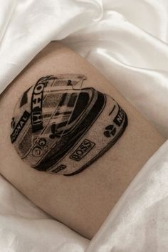 a close up of a person's arm with a tattoo on it