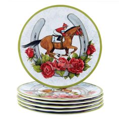 four plates with horses and roses painted on the front, one has a jockey on it