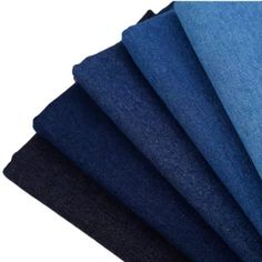 five different colors of fabric on top of each other, one blue and the other black