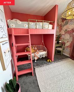 a pink bunk bed sitting next to a green plant in a room with red walls