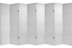 a white room divider with four panels