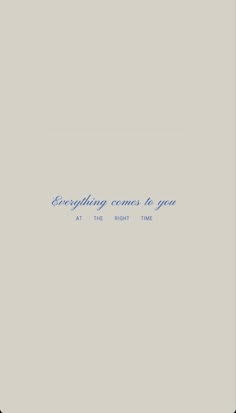 the words everything comes to you at the right time are written in blue on a gray background