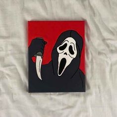 a painting of a person with a knife in their hand and a mask on his face