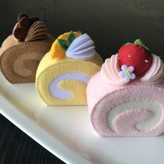 three different types of pastries on a white plate