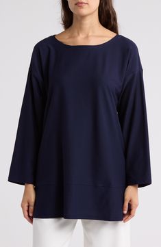 Make styling a chic look easy wearing this tunic top framed with a ballet neck as your base. 30" length (size Small) Ballet neck Three-quarter sleeves 66% viscose, 27% polyamide, 7% elastane Machine wash, line dry Made in the USA Chic Look, Three Quarter Sleeves, Eileen Fisher, Quarter Sleeve, Easy Wear, Tunic Top, Three Quarter, Nordstrom Rack, Shirt Blouses