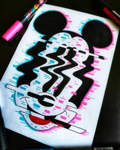 a mickey mouse drawing with markers and crayons