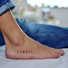 a person's foot with the word sleep written on it and three small stars