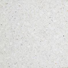 an image of a white marble surface with small speckles on the top and bottom