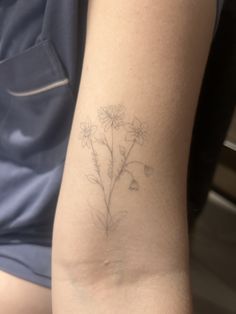 a person with a tattoo on their arm