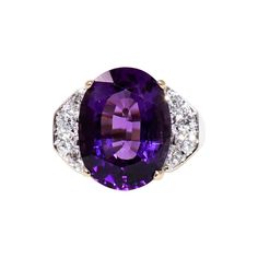 Ring size 7.25 Breathtaking amethyst and diamond cocktail ring bursting with sparkle! This stunning statement piece features a large oval mixed cut amethyst stone in a beautifully saturated purple color. The gorgeous purple stone is vertically set and flanked by icy white diamonds in a crescent shape. It radiates beautifully on the finger while making an impressive and bold statement. This incredible 8.41 carat amethyst stone is prong set in polished 14 karat yellow gold setting. Bright white na Oval Stone Rings, Cocktail Ring Designs, Amethyst Cocktail Ring, Diamond Cocktail Ring, Bold Rings, Crescent Shape, Diamond Cocktail Rings, Yellow Gold Setting, White Gold Diamond Rings