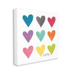 colorful hearts with the word love painted on them in different colors and sizes canvas wall art print