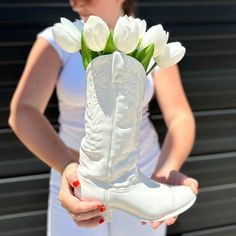 Most boots are made for walking, but these boots are made specifically for stopping the show. Handmade in Dallas, this ceramic Cowboy Boot Vase is the ultimate vessel for your favorite florals. Featuring a white glazed finish, we love this haute take on footwear! Cowboy Boot Vase, Boot Vase, Boots Are Made For Walking, Custom Dresser, Wallpaper Textured, Summer Style Guide, Vintage Credenza, Handmade Ceramics Vase, Cowgirl Chic