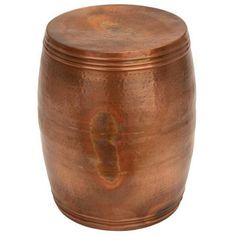 an old copper colored metal container on a white background