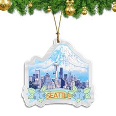 a seattle ornament hanging from a christmas tree