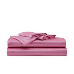 the pink sheets are folded on top of each other