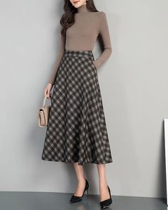 * A high-end midi plaid skirt with flare hem, very cool. * Made of cotton blends, fully lined and with two side pockets. * Fixed waist and side invisible zipper. * Can custom make waist size and skirt length. * Material: Outer-15% cotton, 85% polyester; lining-100% polyester * Size: True to US size, US 0-US 20 are available, you can let us know your usual size and height in your order. * Shipping: Free shipping Processing time : 5-7 Business days Delivery time : 7-20 Business days Tracking numbe Lined Gray Skirt For Fall, Plaid Skirt With Pockets For Winter, Gray Lined Skirt For Fall, Gray Full Skirt For Fall, Fall Gray Skirt With Pockets, Long High Waisted Plaid Skirt, Business Skirt Outfits, Chic Long Plaid Skirt, Plaid Full Skirt With Lining