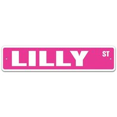 a pink street sign with the word lilly st in white letters on it's side