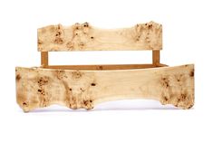 a bed frame made out of wood on a white background