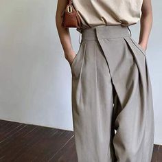 SPECIFICATIONSWaist Type: HIGHStyle: CasualSeason: Spring/AutumnPattern Type: SolidPants: TrouserPant Style: Wide Leg PantsOrigin: CN(Origin)Model Number: NKZ042Material: polyesterLength: Full LengthItem: Suit pantsHigh quality: YesGender: WOMENFront Style: PleatedFit Type: LOOSEFabric Type: BroadclothDropshipping: YesDecoration: AsymmetricalClosure Type: Elastic WaistBrand Name: FeiernanAge: Ages 18-35 Years Old Women's Pantsuit, Office Elegant, Pantsuits For Women, Classic Pants, Pants Vintage, Elegant Casual, Suit Pants, Casual Trousers, Office Ladies