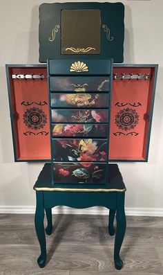 an old dresser has been painted with floral designs