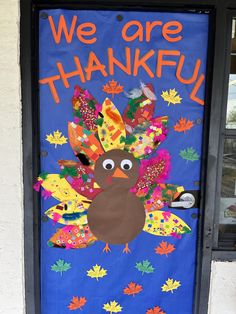 a decorated door with a turkey on it