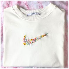 Nike Embroidered Shoes, Nike Floral Embroidery Crewneck, Embroidered Flowers On Clothes, Hand Embroidery Nike Logo, Nike Floral Embroidery Sweatshirt, Nike Floral Embroidery, Sweatshirts With Embroidery, Cute Sweatshirt Designs Embroidery, White Cat Embroidery