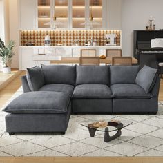 a living room filled with furniture and a piano