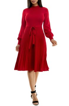 A tonal sash accentuates your figure in a long-sleeve sweater dress with a flattering fit-and-flare profile. 41 1/2" length Mock neck
 Long sleeves 78% rayon, 22% polyester Machine wash, tumble dry Imported Model stats: 5'10" height, 32" bust, 25" waist, 36" hip. Chic Pleated Long Sleeve Dress For Winter, Fit And Flare Long Sleeve Winter Dress, Fall A-line Ribbed Dress, Winter Pleated Long Sleeve Dress, Winter Long Sleeve Fit And Flare Dress, Winter Fit And Flare Dress With Long Sleeves, Fall Ribbed A-line Dress, Ribbed A-line Midi Dress For Fall, Solid Pleated Midi Dress For Winter