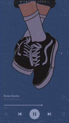 an image of someones feet in sneakers with headphones and music player on the screen