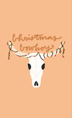 a cow's head with the words christmas cowboys written on it, in front of an orange background