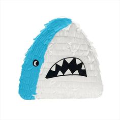 a blue and white shark shaped pinata on a white background with the word shark written in it